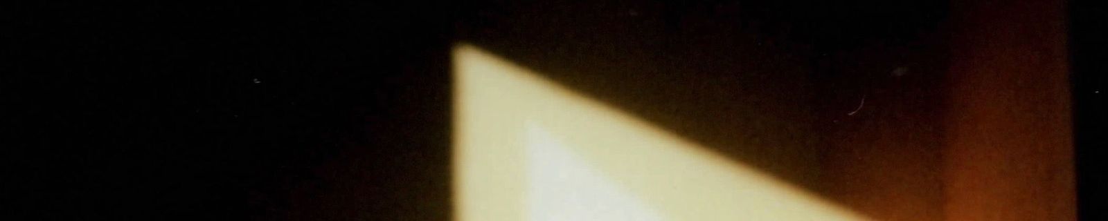 Sunlight shapes on a wall